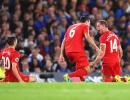 EPL PHOTOS: Henderson stunner headlines Liverpool win over Chelsea