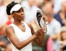 Error-prone Venus heaps praise on Muguruza after Wimbledon heartbreak