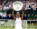 Wimbledon champion Muguruza eyes more trophies not rankings