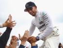 Hamilton marks 200th race with victory in Belgium