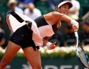 French Open PIX: Muguruza, Raonic through to last 16; Dimitrov out