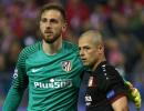 Atletico march into quarters as Oblak shines