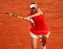 French Open PHOTOS: Wozniacki survives scare, Muguruza advances