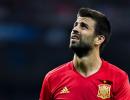 Catalan Pique jeered by fans at Spain training session