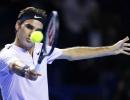 Federer digs deep to beat Mannarino and reach semis