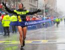 PIX: Kawauchi, Linden record shock wins in rain-soaked Boston Marathon