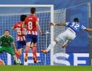 Football briefs: Barca sniff title after Atletico lose