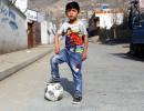 Afghan 'Messi boy' forced to flee home