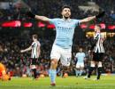 PHOTOS: Aguero treble gets City back on track; United keep up chase