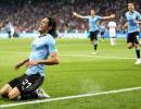 World Cup PIX: Brilliant Cavani brace earns Uruguay win over Portugal