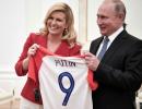 Croatian leader hands Putin soccer shirt before World Cup final