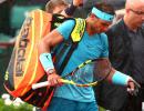 French Open: Nadal trails as rain suspends play