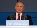 Defiant Putin welcomes World Cup as Russia win