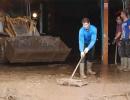 PIX: Nadal joins volunteers in clean-up op after floods in Majorca