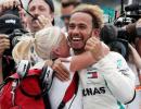 Mature Hamilton humbled by winning a fifth F1 title