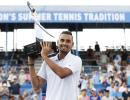 Kyrgios fights off injury to win Citi Open