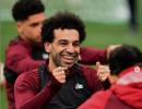 Liverpool's Salah feeling the heat in title chase