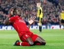 EPL PHOTOS: Liverpool, City march on as Spurs slip again