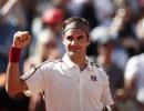 Federer earns milestone; Nadal powers past Goffin