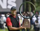 Woods wins in Japan, ties Snead for PGA Tour record