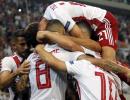 PHOTOS: Olympiakos hold Spurs, City win