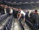 Tottenham's Dier jumps into stands to fight a fan