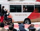 Crowds again greet Olympic flame amid virus concerns