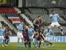 Champions League: City fight back to beat 10-man PSG