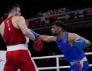 Gutsy Satish Kumar goes down to World champ Jalolov