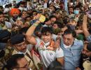 PIX: Frenzy, chaos as India's Olympics heroes return