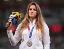 Athlete auctions Olympic medal for infant's surgery