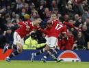 PICS: Manchester Utd edge Palace; Spurs have it easy