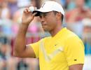 Recovering Tiger Woods in 'good spirits'