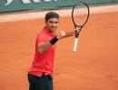 Federer happy to find higher gear against Cilic