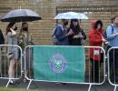 Just like old times as rain delays start of Wimbledon