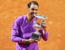 Nadal overcomes blip to down Djokovic in final