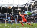 PICS: Manchester City ease past Everton to go second