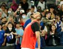 Showman Kyrgios goes from sick-bed to second round