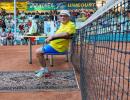 World's oldest tennis player stays put in Ukraine