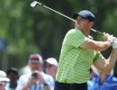 PGA Championship: McIlroy grabs lead as Woods falters