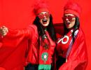 PIX: Morocco, Croatia fans paint the stadium RED