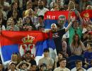 Djokovic's dad seen with fans carrying Russia flags