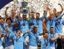 PIX! Champs Man City complete treble!