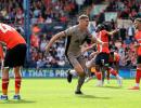 EPL PIX: Ten-man Tottenham go top after win at Luton