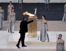 PIX: Paris organisers receive Olympic flame in Athens