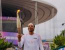 PIX: Snoop Dogg carries Olympic Torch!