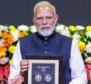RSS centenary: PM releases stamp, coin featuring Bharat Mata