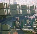 China displays new missiles, weapons as Xi hosts Putin, Kim