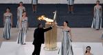 In Pictures - Paris organisers receive Olympic flame in Athens