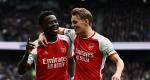 In Pictures - Arsenal hang on to beat Spurs, maintain lead; City keep pressure